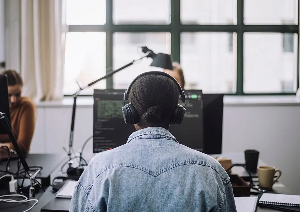 Young woman in front of a monitor at the office